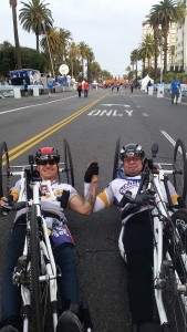 Owen Daniels, left, was all smiles after winning the men's handcylcing competition of the Asics LA Marathon on March 15, 2015. Michael Reardon, right, came in second place.