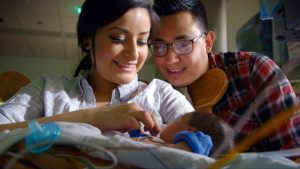 In the first episode of “Life on the Line,” Janett Anguiano and Gian Ledesma hold their baby, Theodore, for the first time 10 days after he was born.