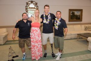  Bethany Hamilton stuck around the PossAbilities Sports Luncheon to meet with fans and athletes, including PossAbilities members Greg Crouse (left), Andre Barbieri (center) and Zimri Solis.