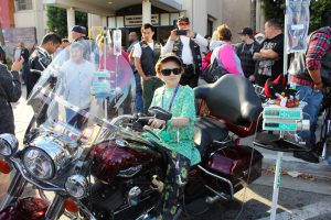 LLUCH patient, Zander Moncada, 11, from San Jacinto, climbed aboard one of the participating motorcycles of the 23rd annual Toy Run presented by Quaid Harley-Davidson on Sunday, Dec. 13.